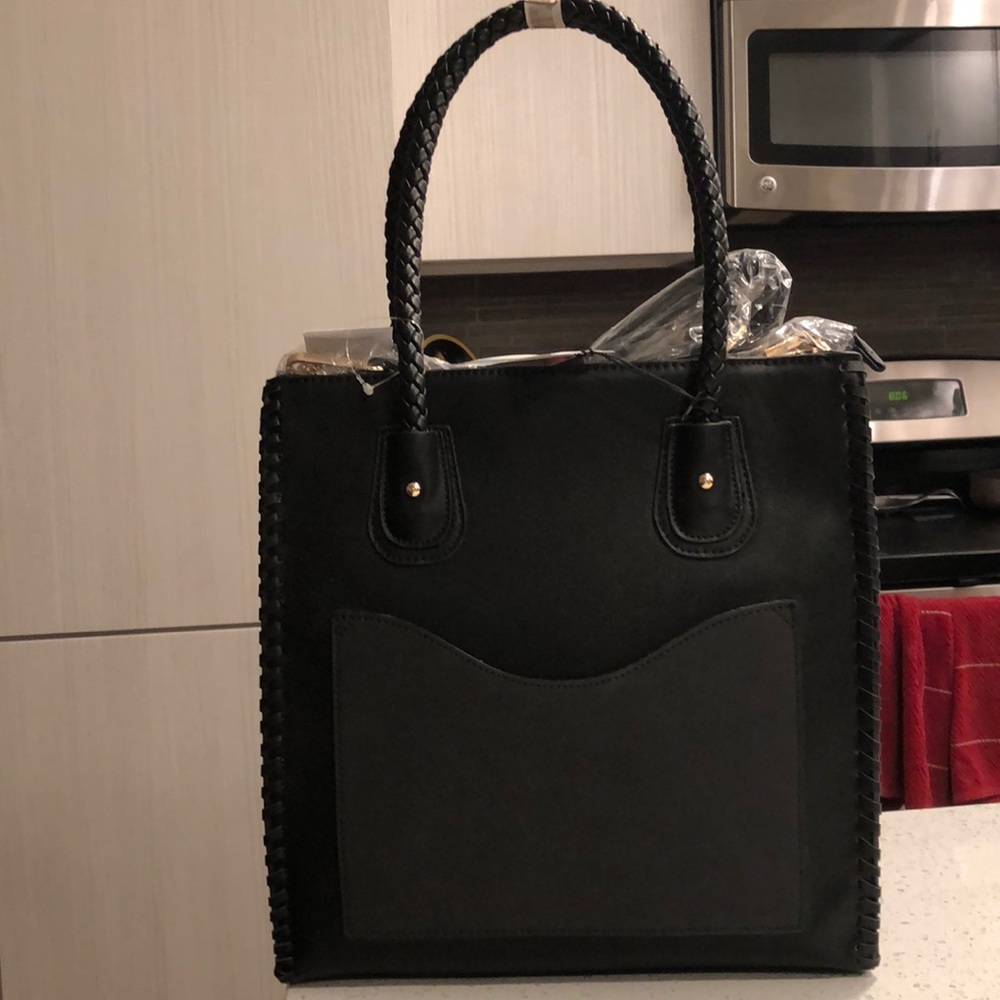 Black leather purse with detachable shoulder strap